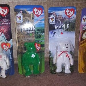 4 pc collection of TY special edition beanie babys